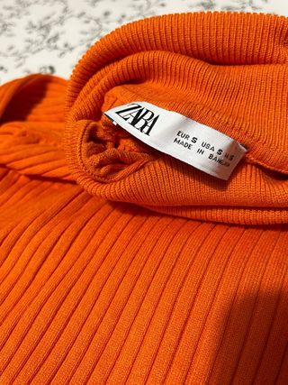 Jersey cuello vuelto canalé naranja