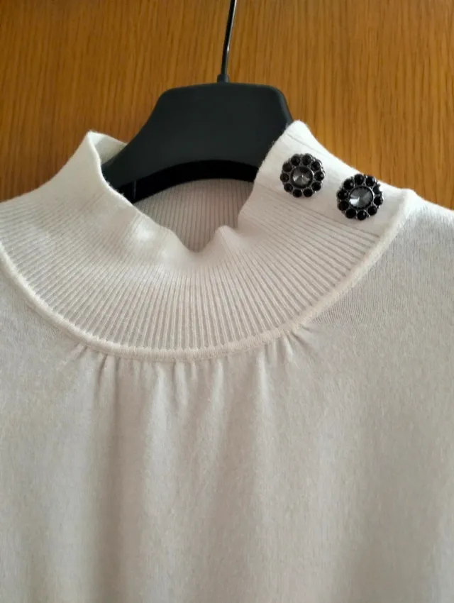 Jersey blanco cuello alto mujer