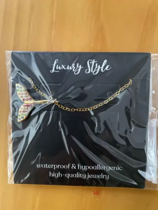 Pulsera de perlas y acero dorado