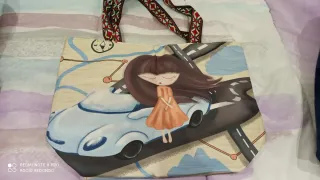 Bolso de tela con dibujo de muñeca