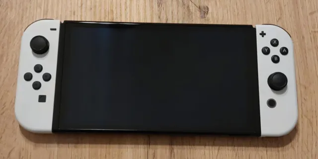 Nintendo Switch OLED + 3 giochi