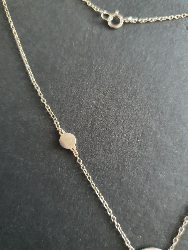 Collar de plata con círculo