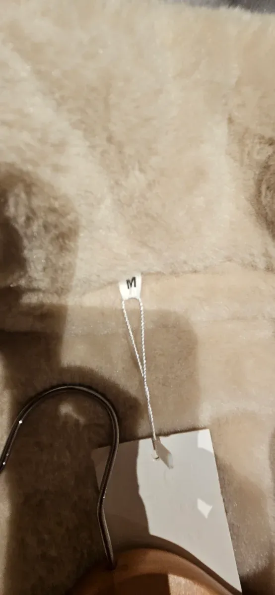 Chaqueta de invierno beige y marrón