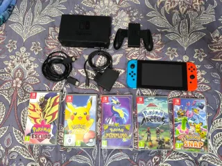 Nintendo Switch + 5 Giochi Pokémon
