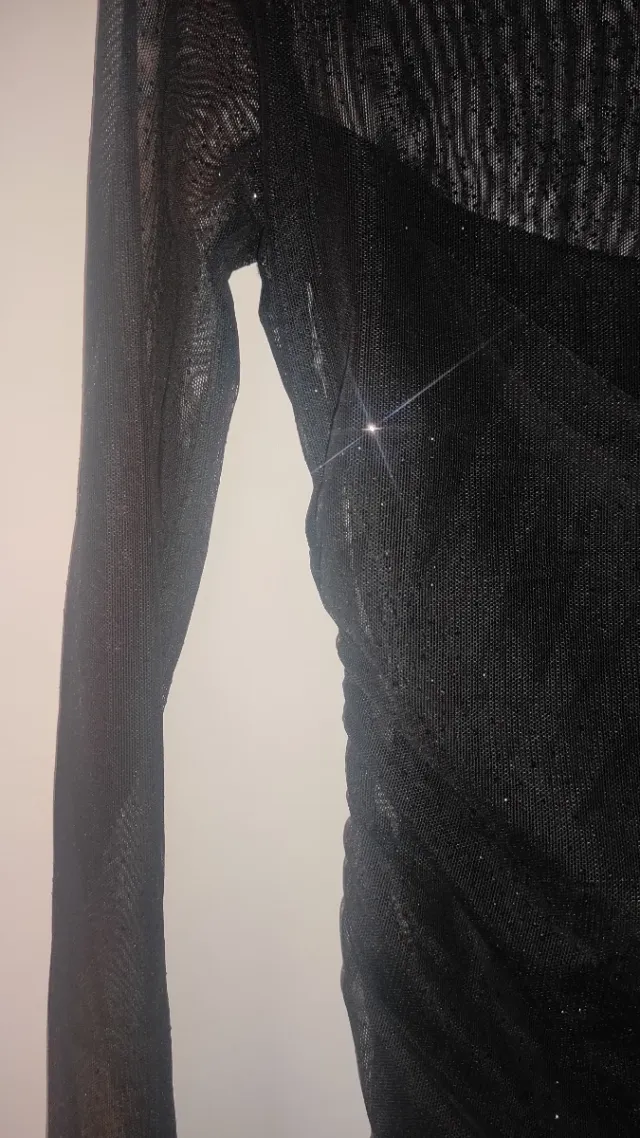 Top negro transparencia cuello halter