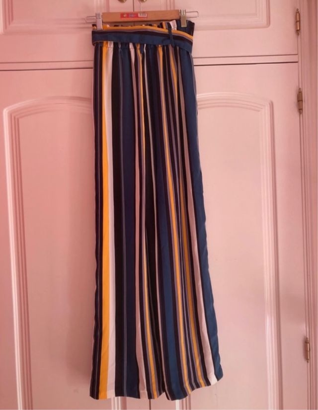 Pantalones fluidos rayas hebilla