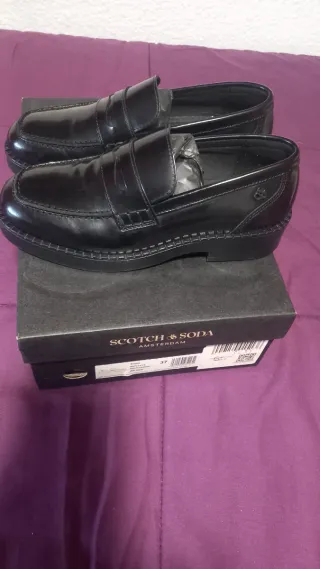 Mocasines de piel negra