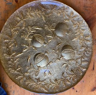 Vassoio rotondo in vetro dorato