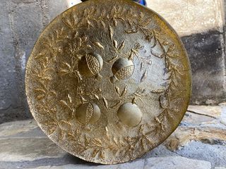 Vassoio rotondo in vetro dorato