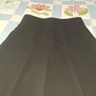 Pantalón elegante negro pata ancha de Zara