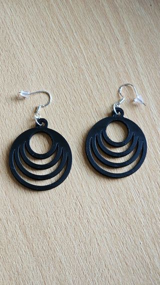 Pendientes negros circulares