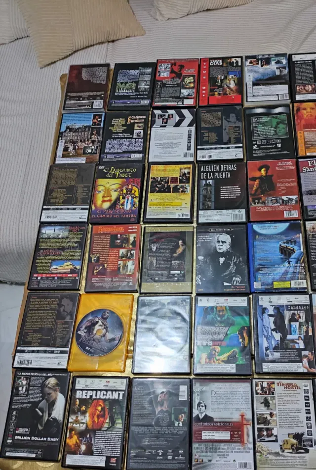 Lote 60 DVD di film originali, ce ne sono più di 60!