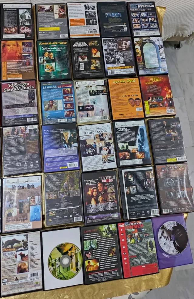 Lote 60 DVD di film originali, ce ne sono più di 60!