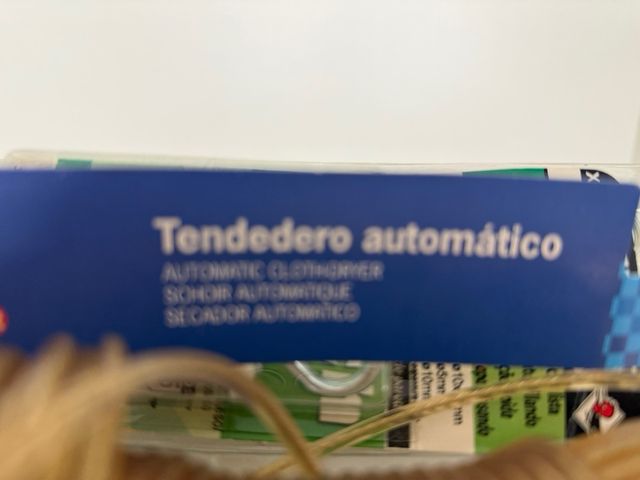 Tendedero automático para pared