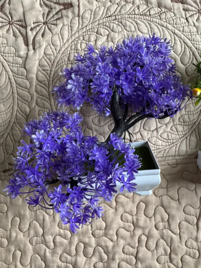 Planta topiaria artificial con maceta