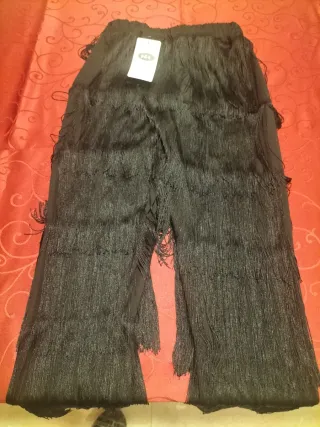 Pantalón de mujer con flecos