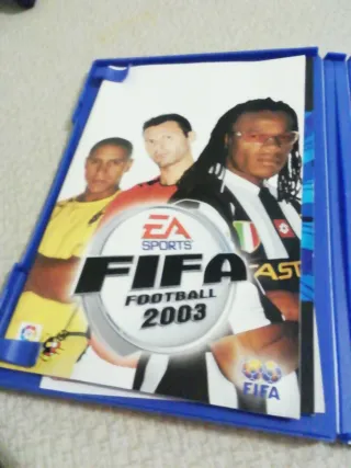 Mando PS2 Negro + Juegos