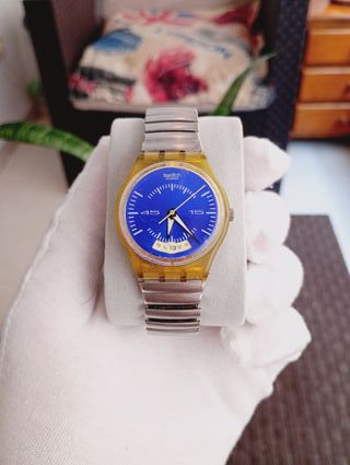 Reloj Swatch Azul y Plateado