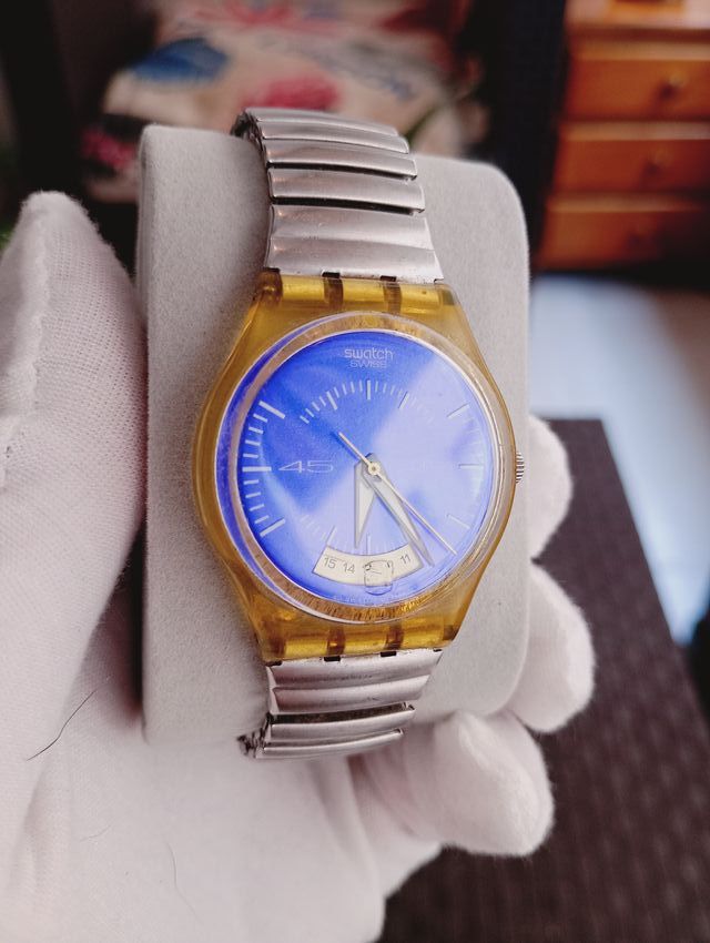 Reloj Swatch Azul y Plateado