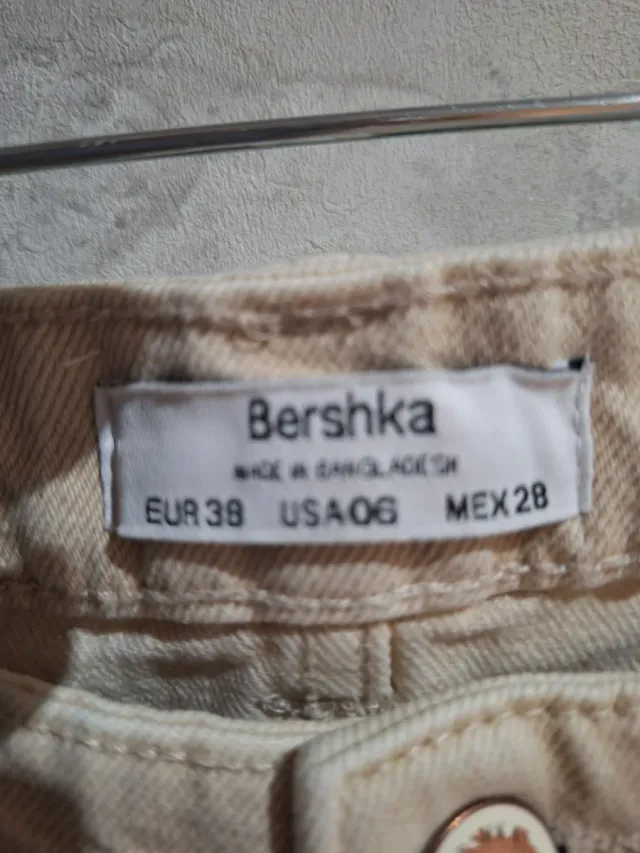 Pantalón vaquero ancho Bershka beige desgarrado