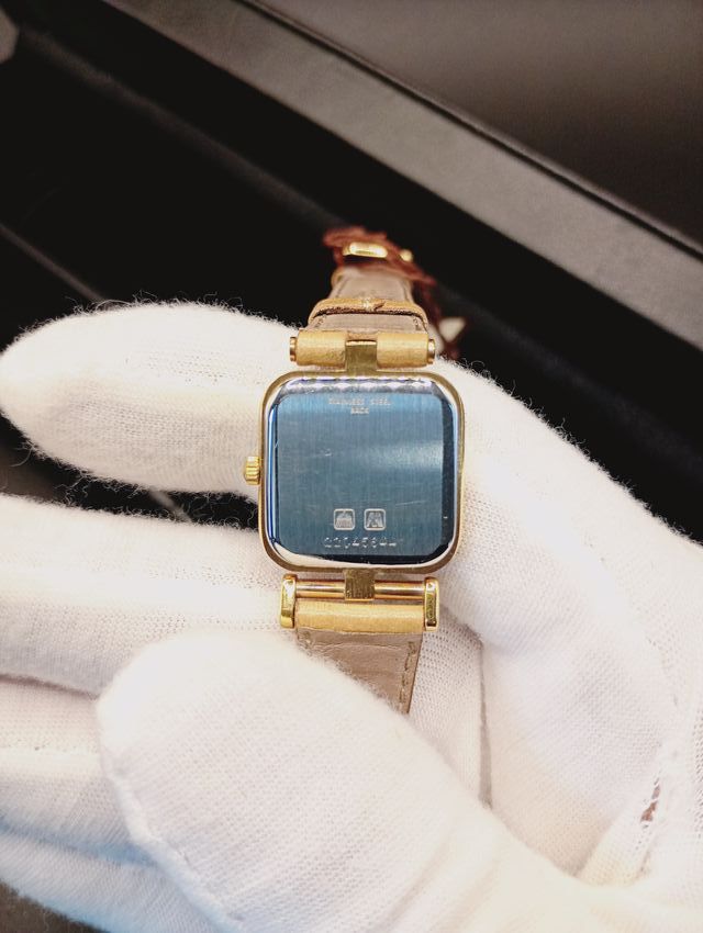 Reloj Longines Beige y Dorado