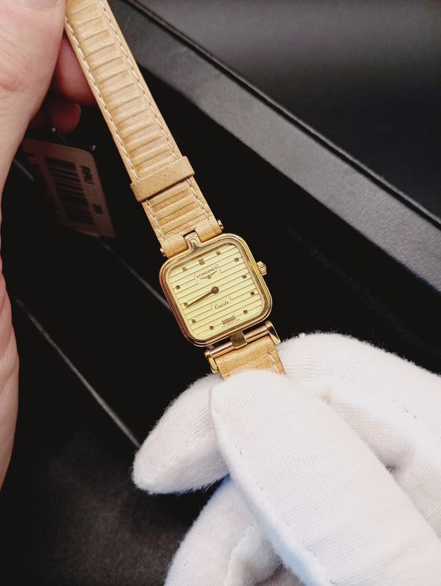 Reloj Longines Beige y Dorado