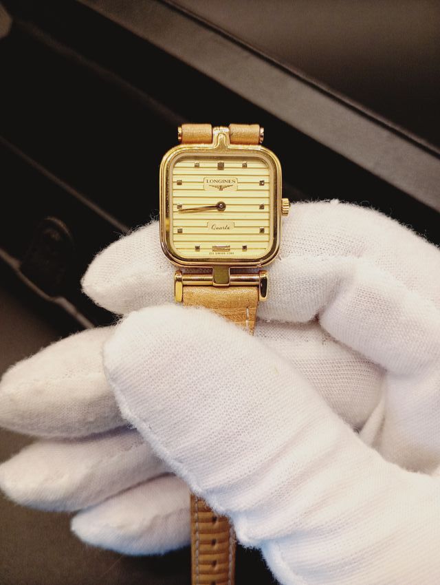 Reloj Longines Beige y Dorado