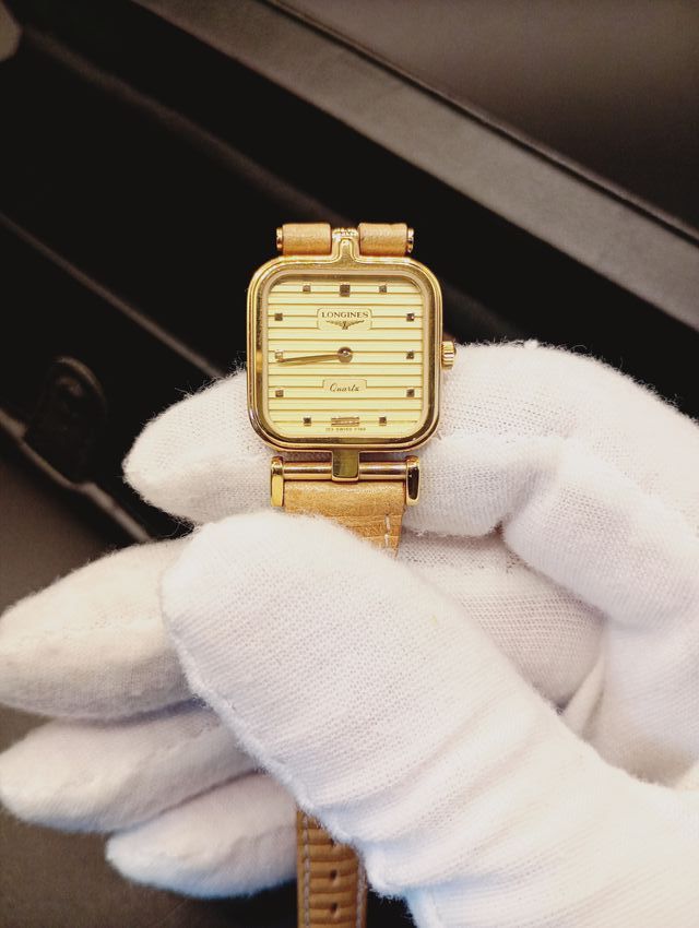 Reloj Longines Beige y Dorado
