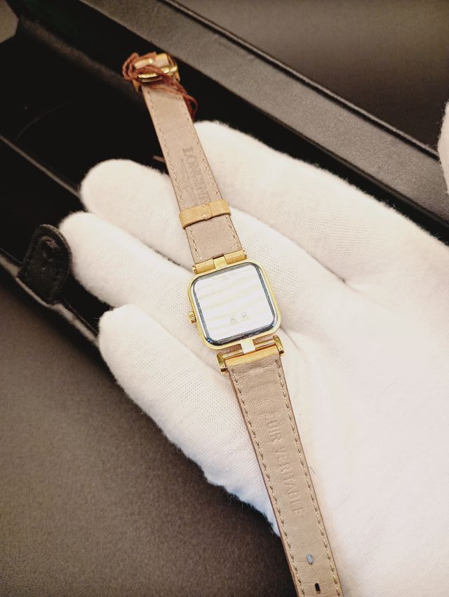 Reloj Longines Beige y Dorado