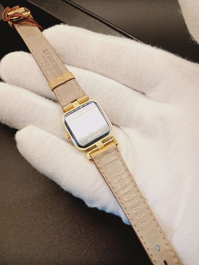 Reloj Longines Beige y Dorado