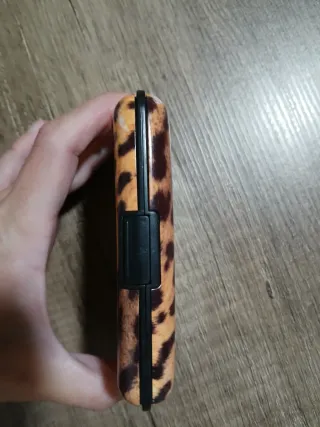 Tarjetero desplegable estampado leopardo