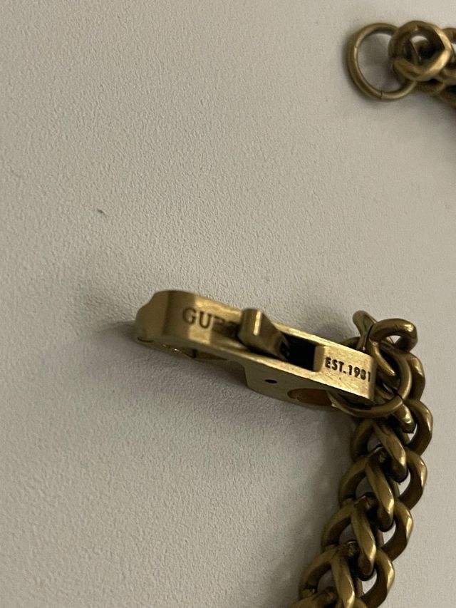 Conjunto Cadena y Pulsera Guess Dorados