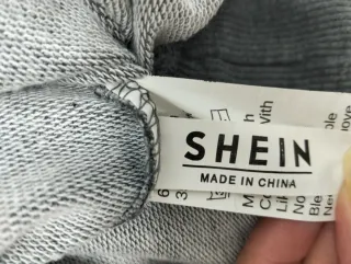 Sudadera gris y blanca talla S