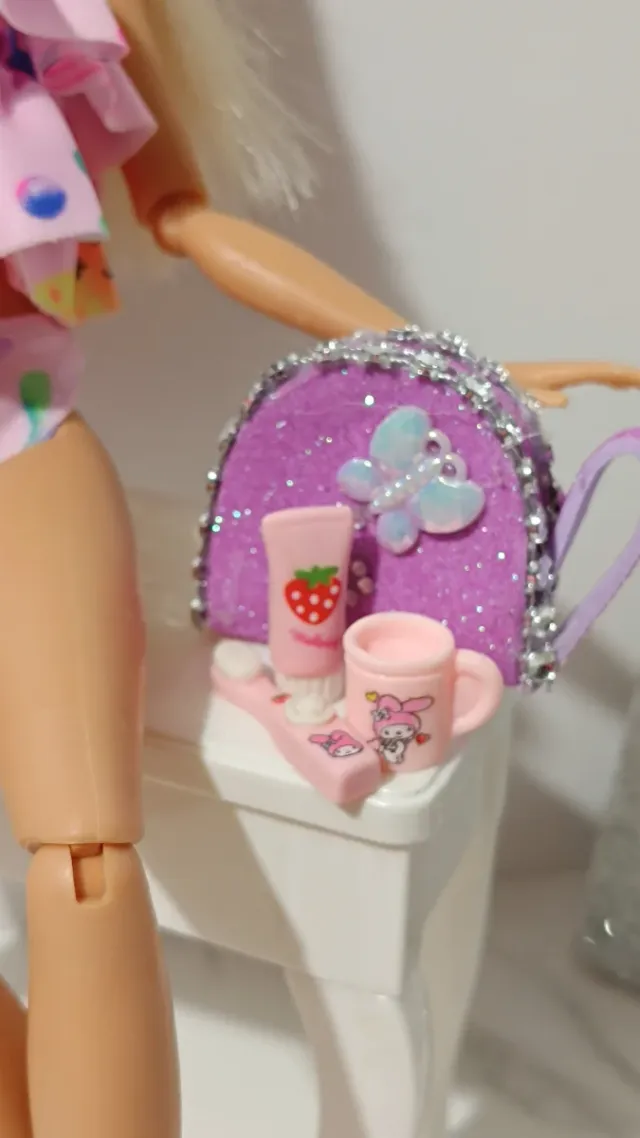 Barbie articulada con accesorios