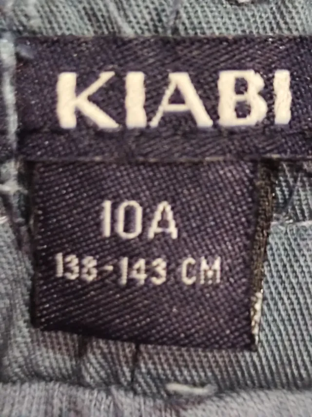 Pantalón niño dinosaurios gris