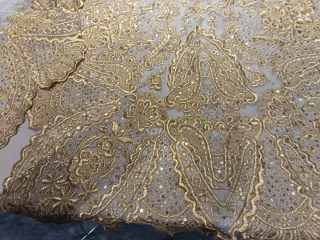 Manteletas doradas infantil