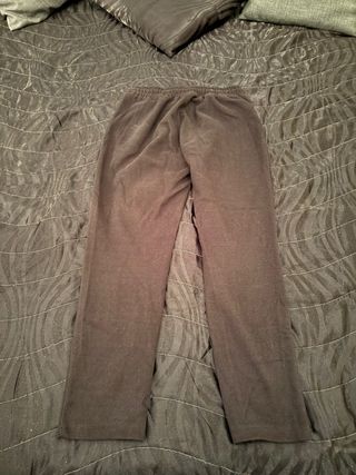 Pantaloni neri con lacci e molla