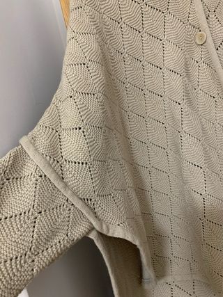 Poncho de malha com botões