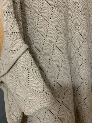 Poncho de malha com botões