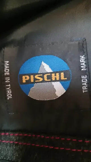 Abrigo de caballero gris. Hecho en Austria.