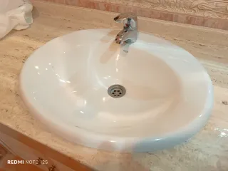 Lavabo de encastrar ROCA con grifo RS. 2 udes.