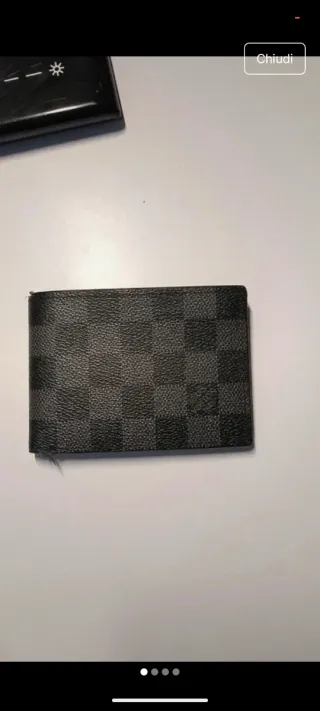 Portafoglio nuovo con difetto