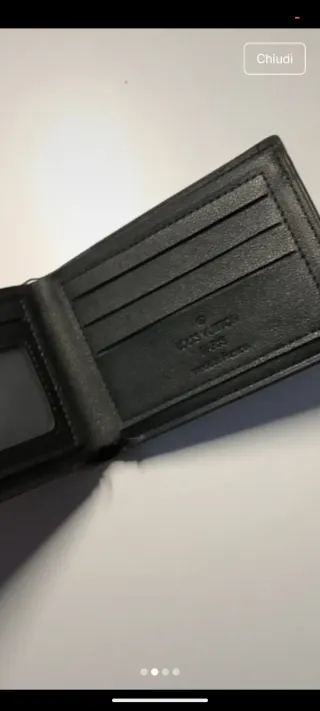 Portafoglio nuovo con difetto