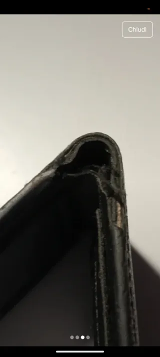 Portafoglio nuovo con difetto