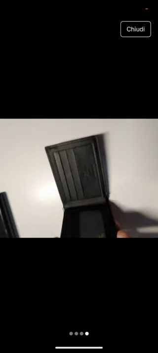 Portafoglio nuovo con difetto