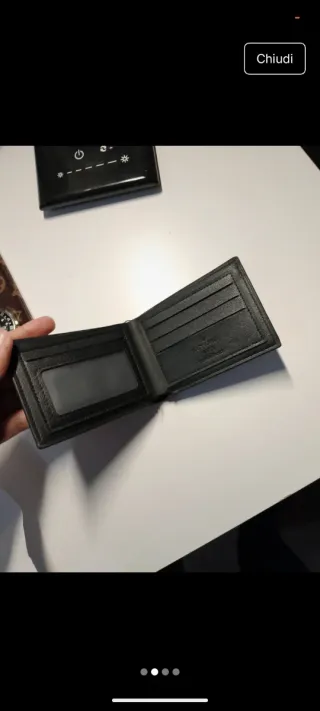 Portafoglio nuovo con difetto