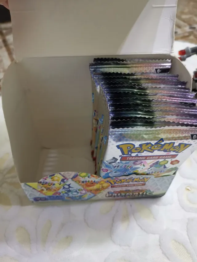 14 Packs Pokémon Prismatic Evolutions