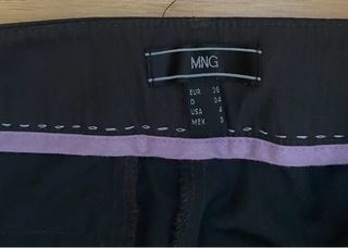 Traje chaqueta y pantalón gris. Mango