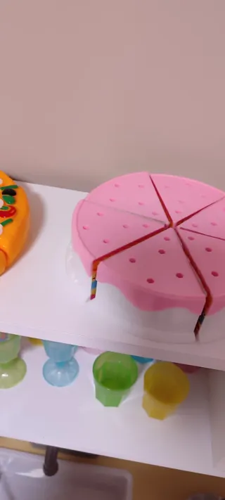 Cocinita infantil rosa y naranja