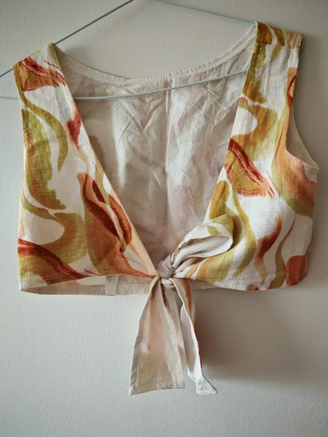 Conjunto pantalones anchos y top lazada a la espal